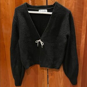 No Boundaries Black V-Neck Sweater with Tie Accent